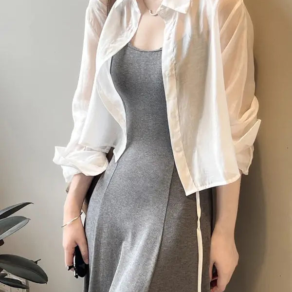 Gray sleeveless dress with white shirt styled with Comfy Sunrise Cardigan for versatile wear