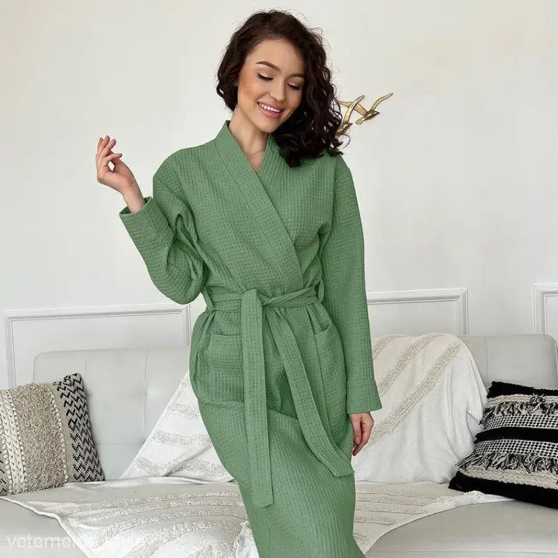 Green waffle-textured long robe with belt and pockets, ideal for comfy waffle robes