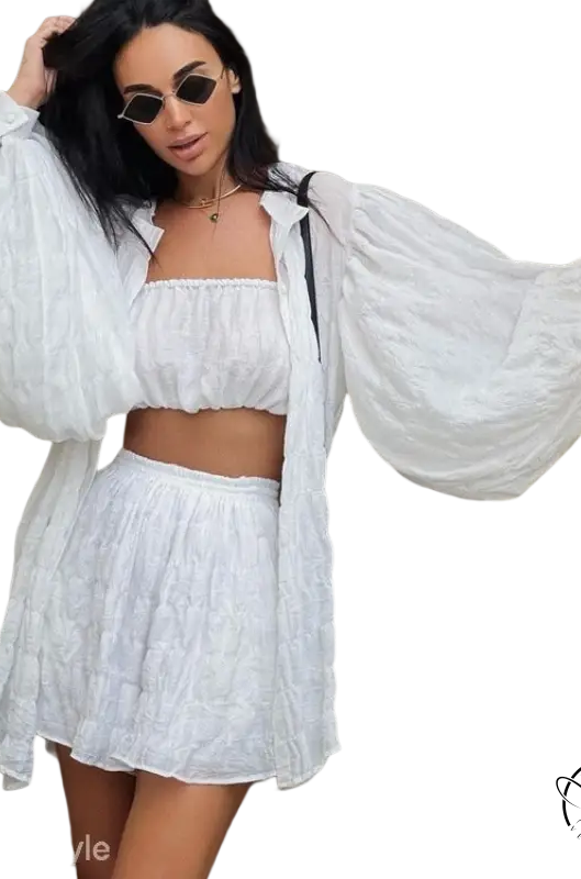 Woman in comfy white summer three-piece set with textured button top