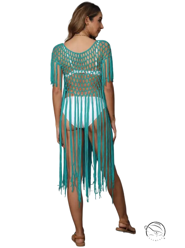 Coral red hand crocheting beach cover-up with turquoise fringe and mesh back