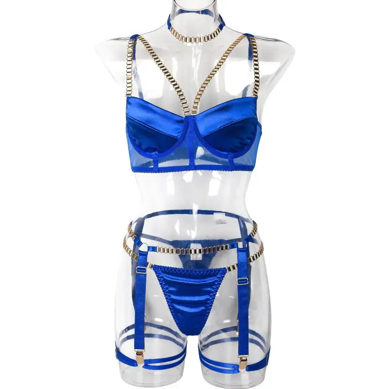 Blue satin lingerie set with gold chain straps and garter belt attachments for four piece set