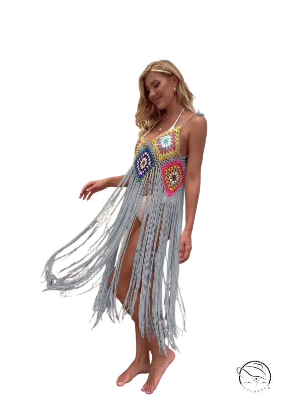 Coral red floral stitching dress with vibrant geometric fringe in light blue