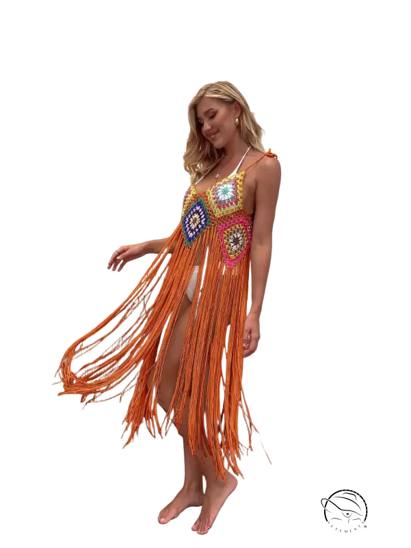 Vibrant coral red floral stitching dress with geometric fringe detail