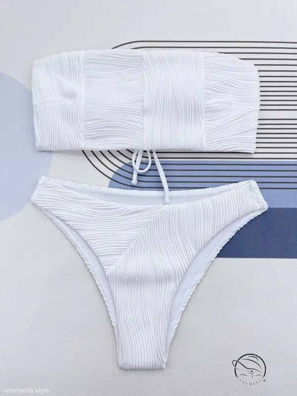 Coral red three dimensional bikini swimsuit with white textured bandeau top