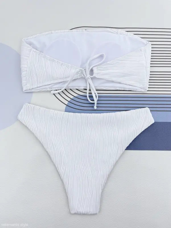 White ribbed three dimensional bikini set with bandeau top and high-cut bottom in Coral Red for summer vacations