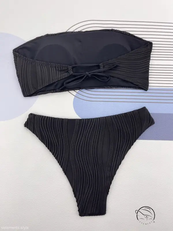 Coral red three dimensional bikini with black strapless textured top