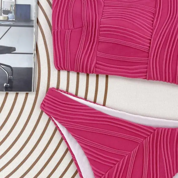 Hot pink textured three dimensional bikini set with bandeau top and bottoms for summer vacations