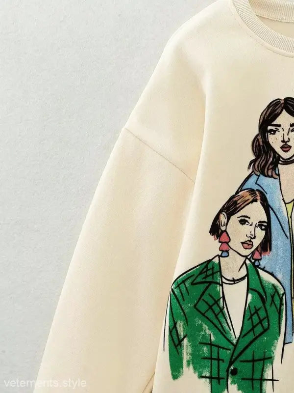 Cream-colored cute pattern sweater featuring graphic print of two stylized women in color outfits