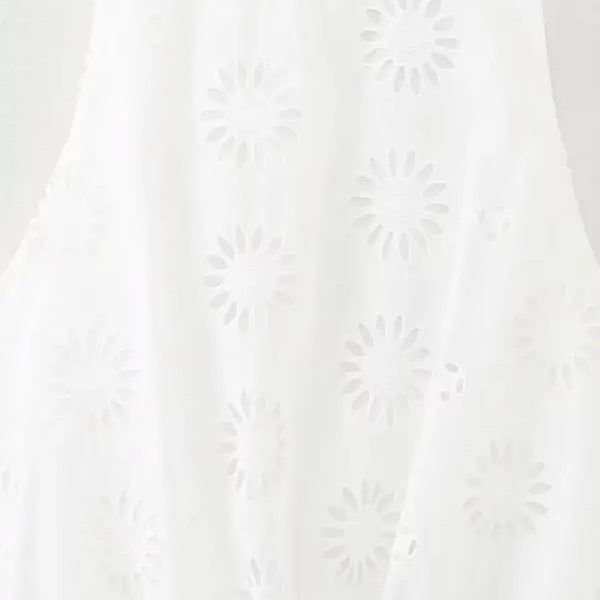White fabric with subtle floral embroidery from Enchanting Cutout Embroidered Skirt Set with free shipping