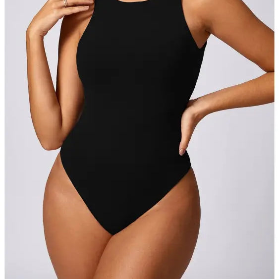 Sleeveless dark coffee tight yoga jumpsuit for sporty wear and flexible fitness activities