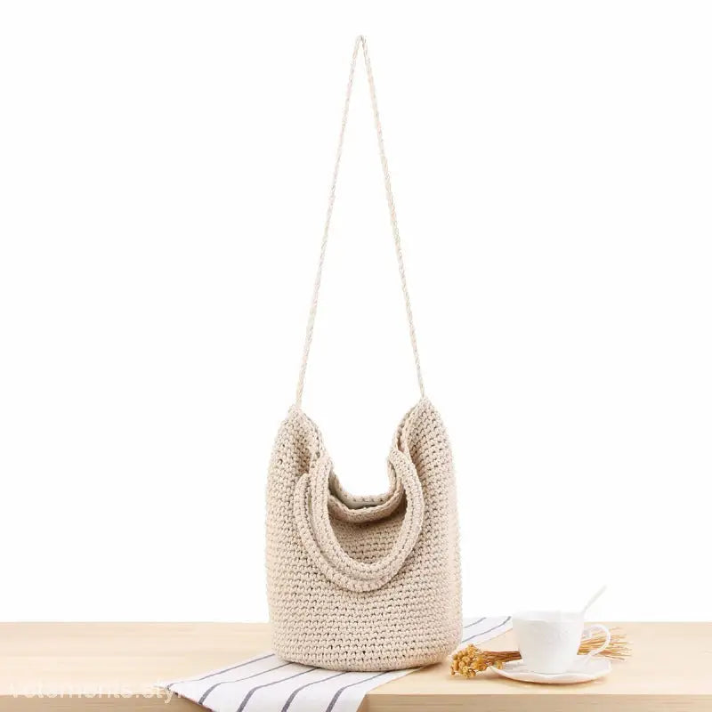 Crocheted beige bohemian shoulder bag with essential care guidelines for durability