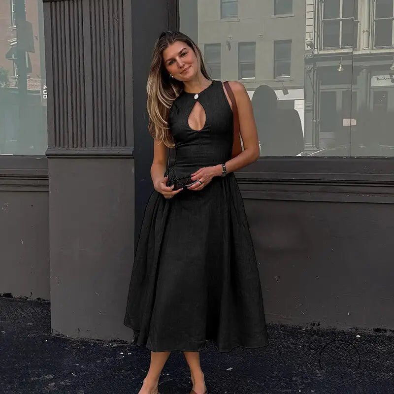 Woman in elegant A-line midi dress with keyhole crew neck sleeve