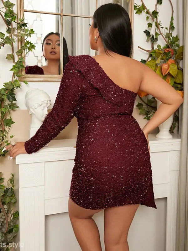 Luxury sequined dress featuring a burgundy one-shoulder design at Vetements Style