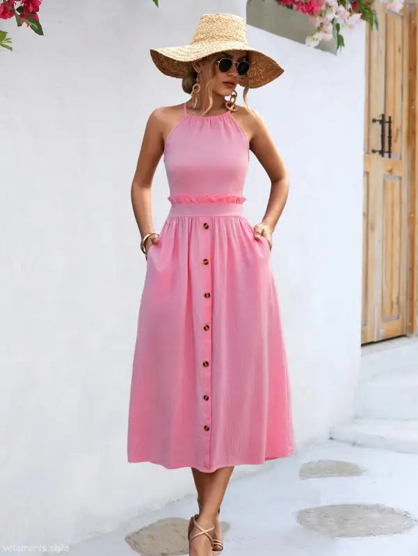 Pink halter-neck midi dress with button-front skirt and ruffle waist, elegant backless dress for summer
