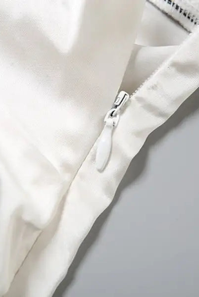 Elegant Backless Lace Split Dress featuring a white satin garment with zipper detail