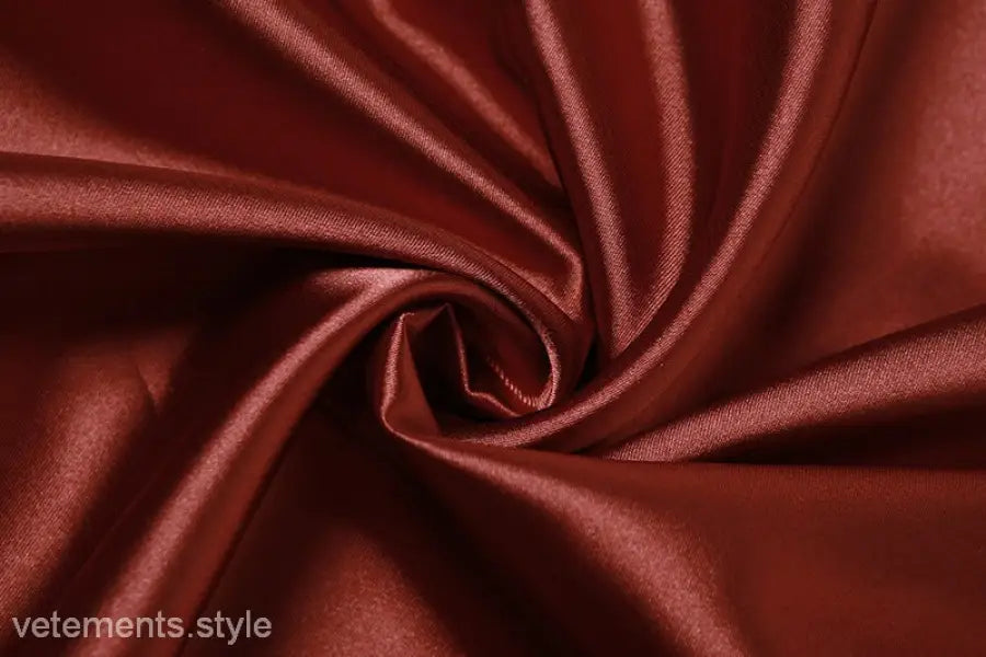Elegant halter backless satin dress with luxurious swirling reddish-brown fabric