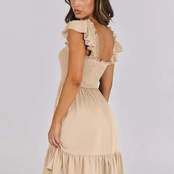 Beige sexy backless short mini dress with ruffle detail for elegant evening wear