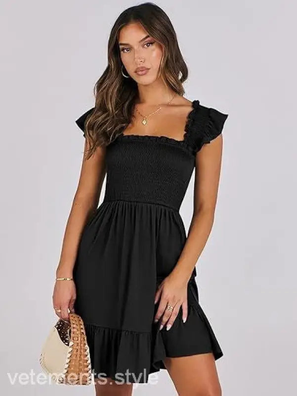 Black smocked bodice sexy backless short mini dress with ruffle detail