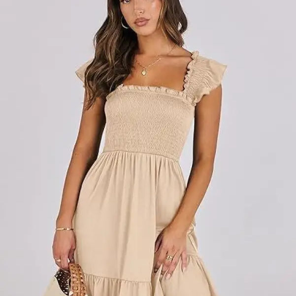 Beige smocked bodice backless short mini dress with ruffle detail for a sexy backless short look