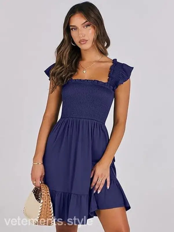 Navy blue smocked elegant backless short mini dress with ruffle detail for stylish occasions