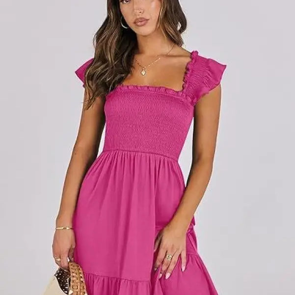 Pink smocked bodice dress featured in Elegant Backless Short Mini Dress with Ruffle Detail