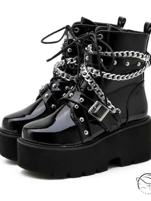 Elegant black high heel thigh high boots with chains and studs