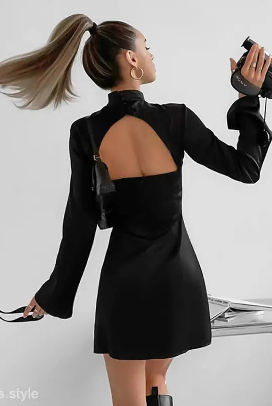 Elegant black short dress with backless design and trumpet sleeves for formal events