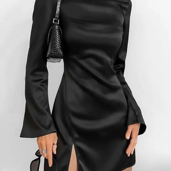 Elegant black short dress with backless design and trumpet sleeves displayed