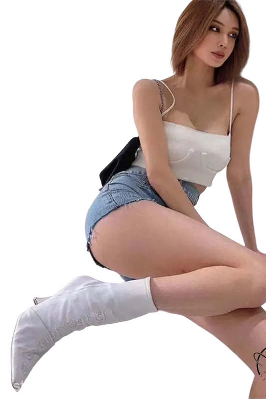 White Single Mile 9cm boots with glossy finish, side zipper, and pointed heel