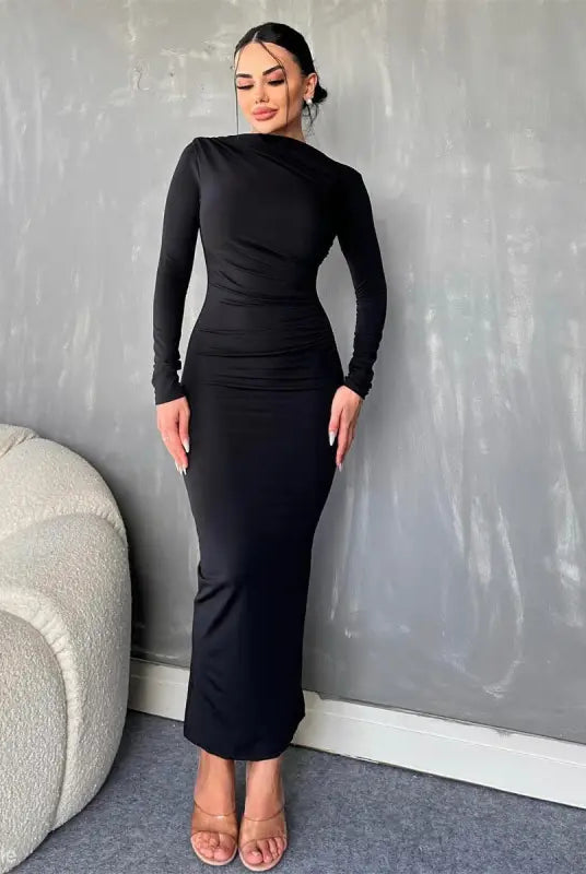 Elegant bodycon dress in black with long sleeves and high neckline for parties