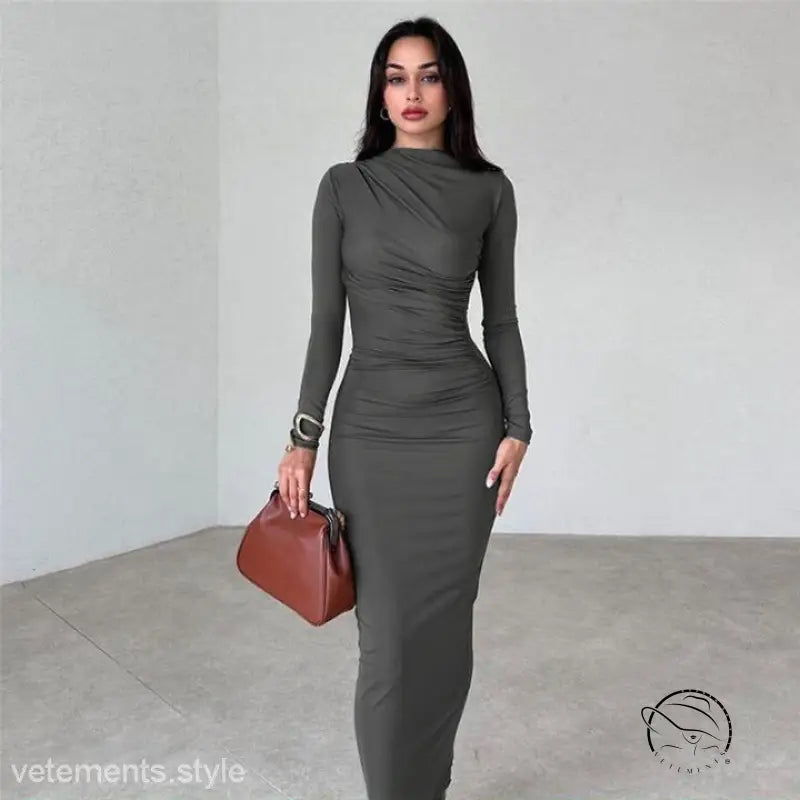 Elegant bodycon dress in dark grey with long sleeves and ruched details