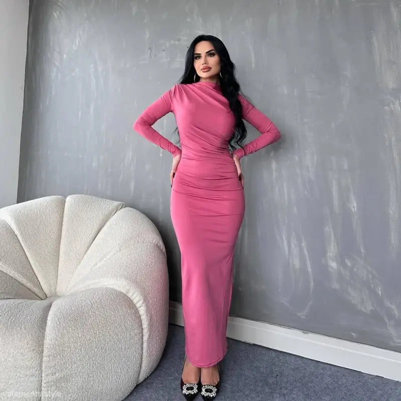 Elegant bodycon dress in coral red or dark grey showcasing a woman in a long-sleeved maxi design