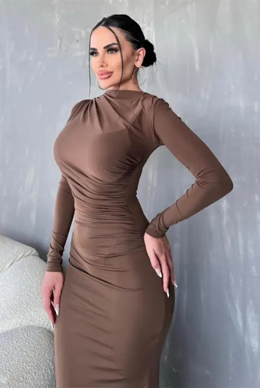 Woman wearing a stylish brown long-sleeved elegant bodycon dress for parties