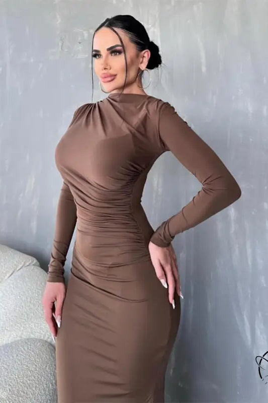 Woman wearing a stylish brown long-sleeved elegant bodycon dress for parties