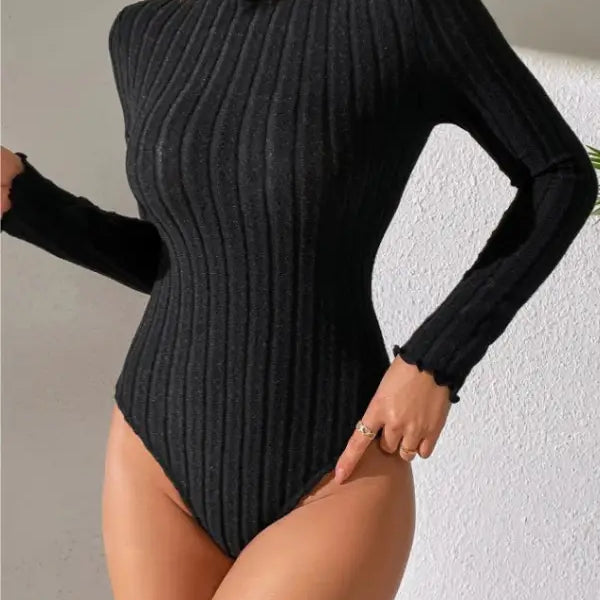 Black ribbed long-sleeve bodysuit with ruffled neckline, perfect for brushed striped jumpsuit styling
