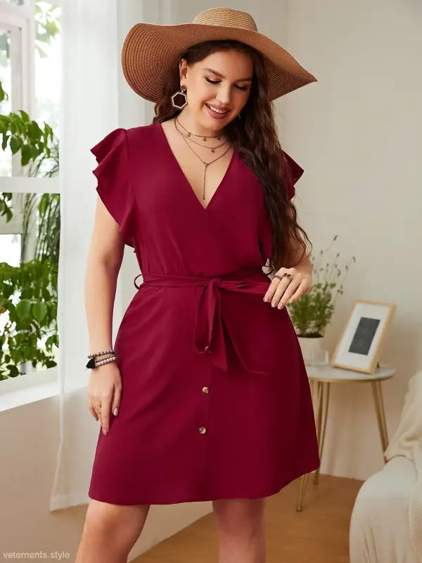 Burgundy butterfly sleeve dress with flutter sleeves and ruffle details for summer wear