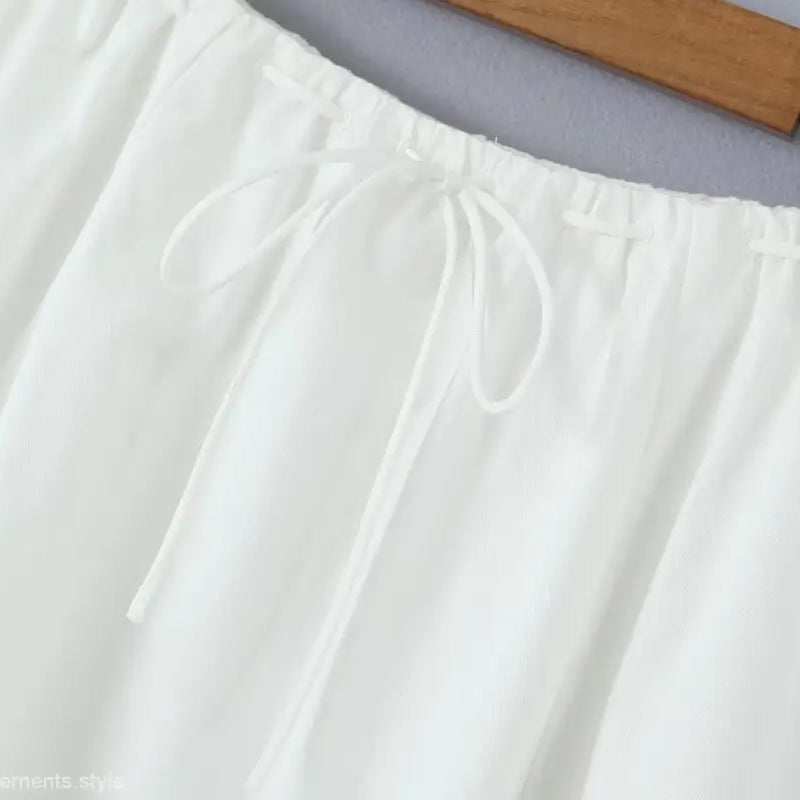 White drawstring blouse from casual skirt set ideal for summer beach outfits
