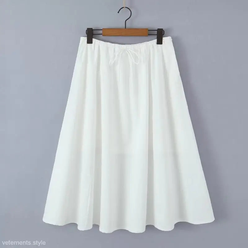 White midi skirt on hanger from Elegant Casual Skirt Set with Puff Sleeves for Summer Beach Wear