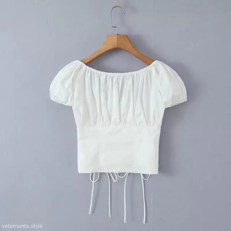 White puff-sleeved crop top from Elegant Casual Skirt Set ideal for casual beach outfits