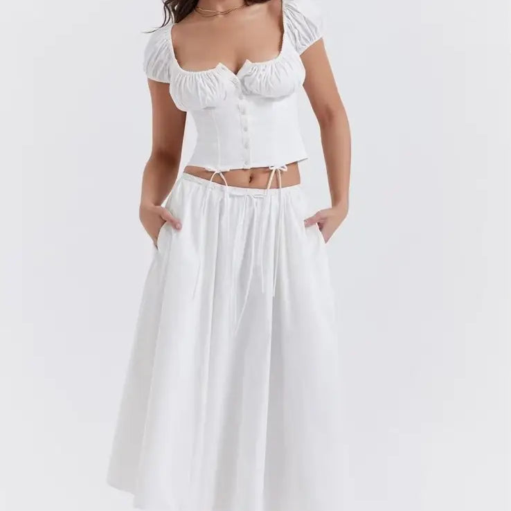 White peasant-style casual skirt set with puff sleeves, ideal for casual beach outfits