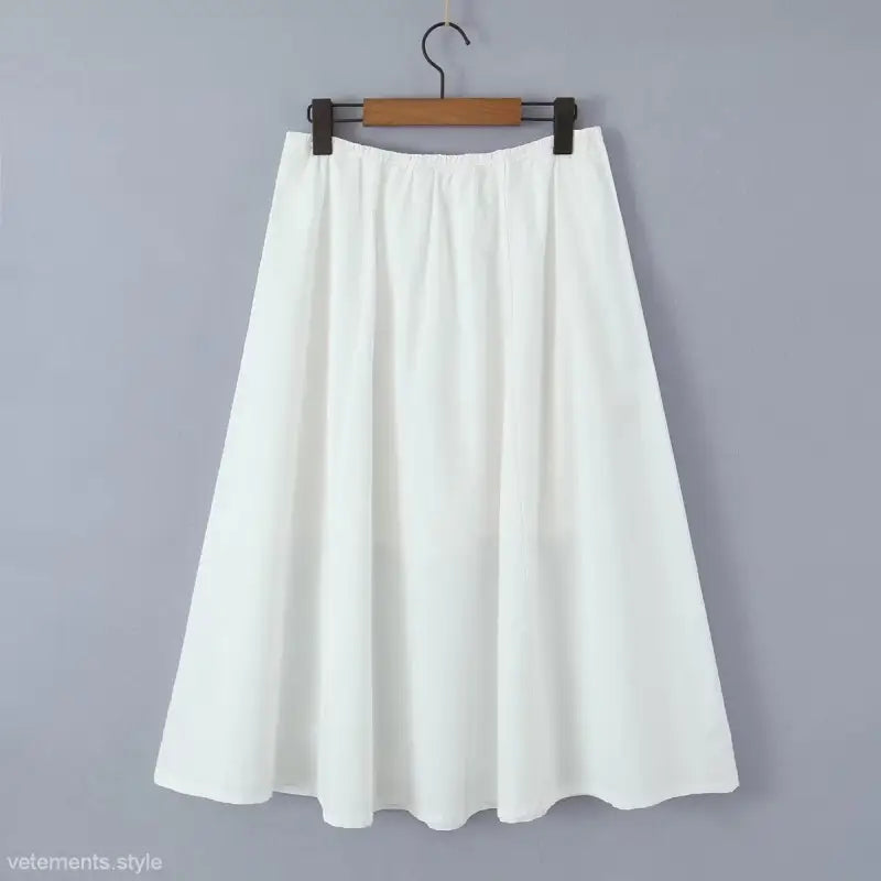 White midi skirt on hanger from Elegant Casual Skirt Set with Puff Sleeves for Summer Beach Wear
