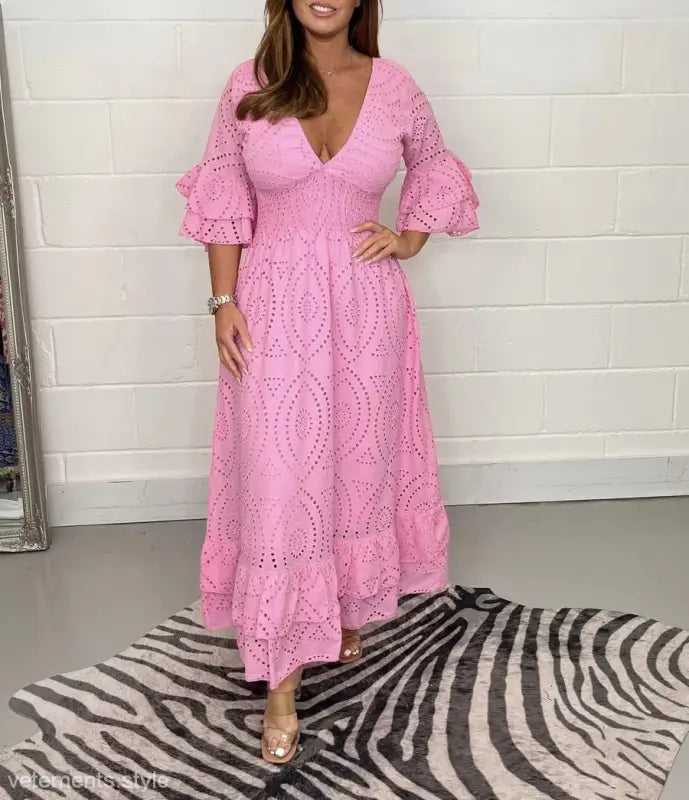 Pink eyelet lace maxi dress featuring ruffled bell sleeves, ideal cotton linen party dress