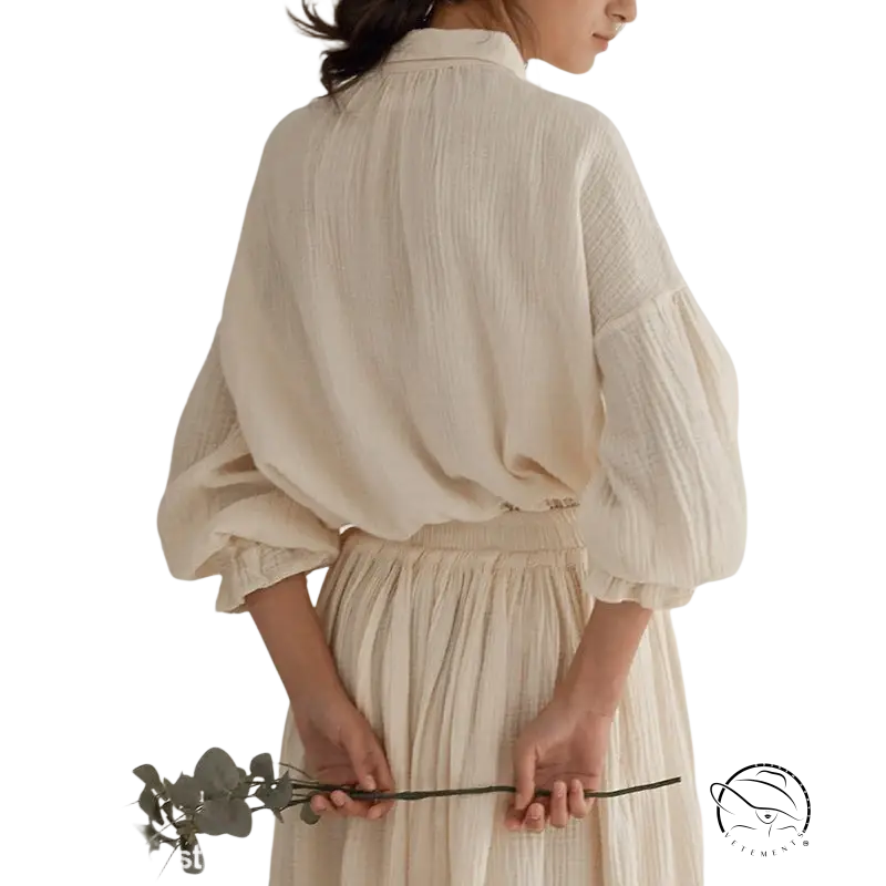 Elegant cotton top with lantern sleeve niche design and creamy textured skirt