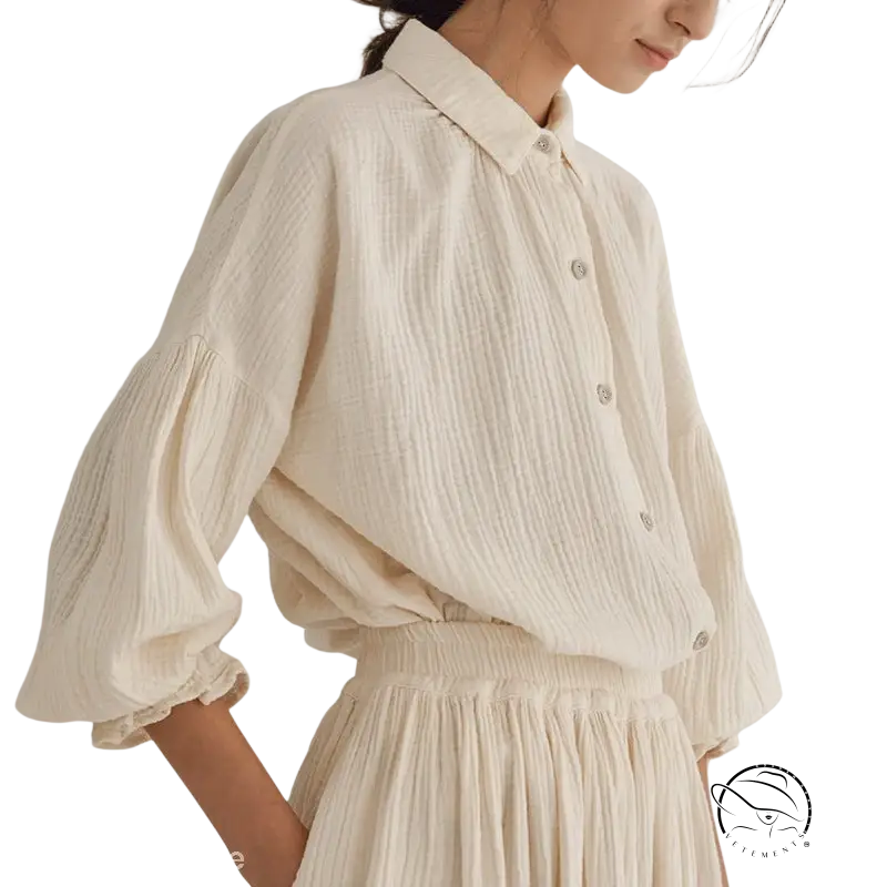 Elegant cream-colored textured cotton top with lantern sleeves and skirt set