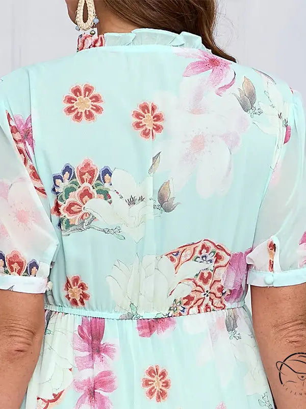 Elegant evening maxi dress in light blue floral chiffon with ruffles