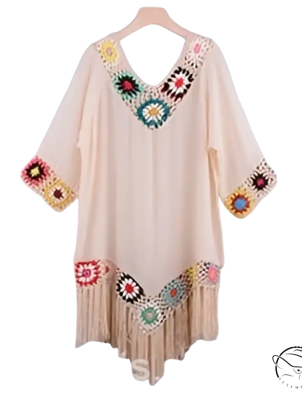 Cream-colored bohemian comfy beachwear dress with crochet details and fringe trim