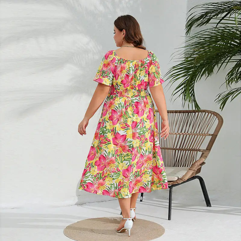 Plus size elegant floral midi dress with off-shoulder design for summer wear