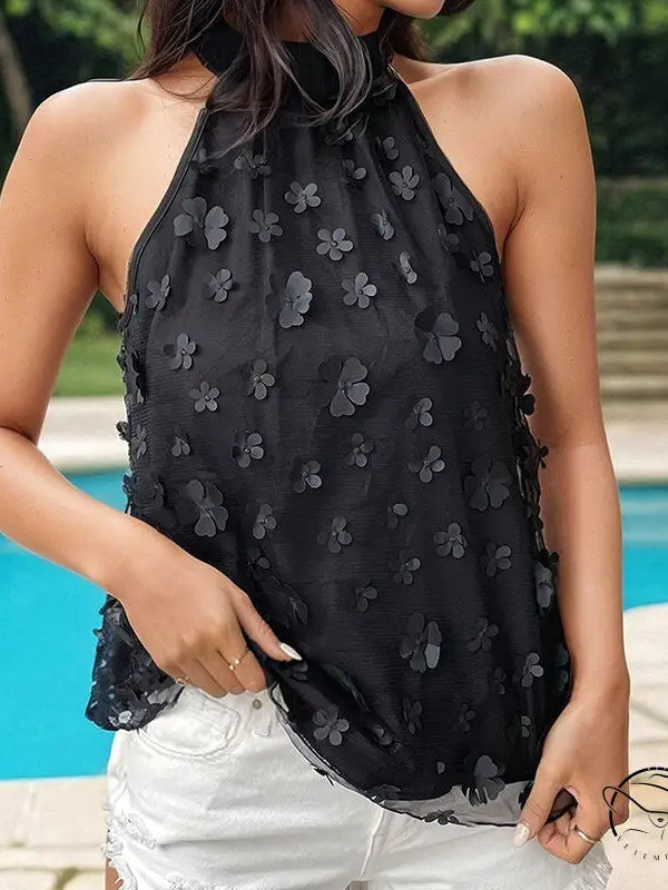 Elegant floral organza mock neck tank top with black halter design and distressed white denim shorts, perfect for fashion enthusiasts seeking free shipping options