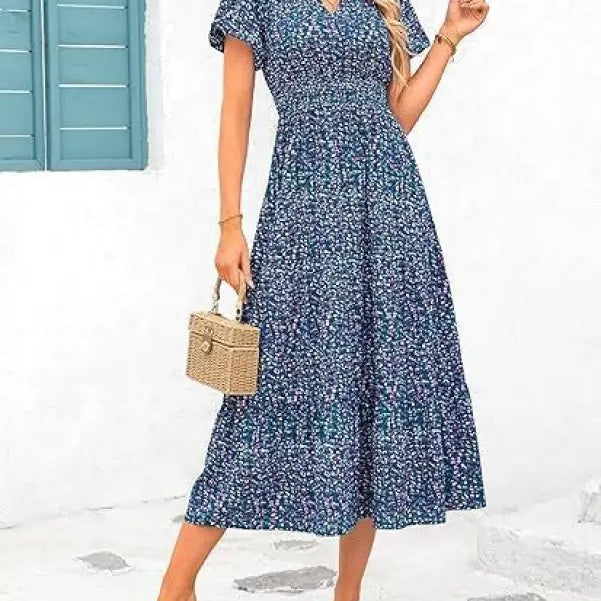 Blue floral print bubble pleated dress with short sleeves and v-neckline design