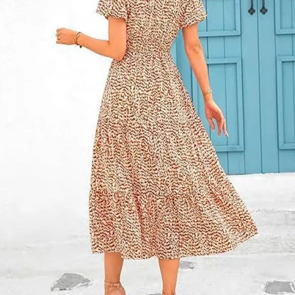 Floral print bubble pleated dress with short sleeves and cinched waist for elegance